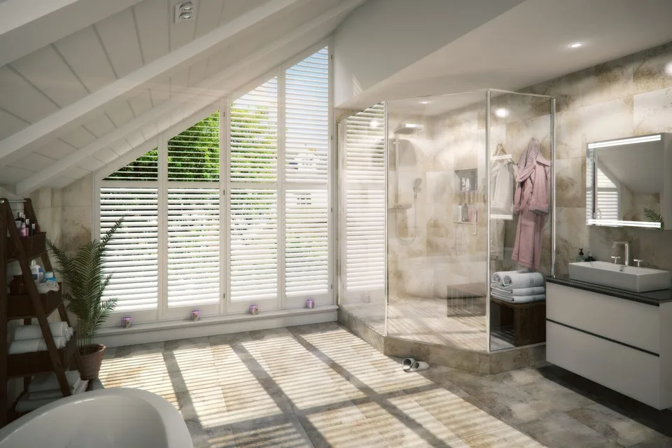Angled white Java shutters in a vaulted bathroom — fully waterproof ABS range.