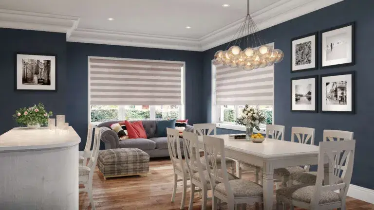 Dining room with horizontal blinds on bright windows.