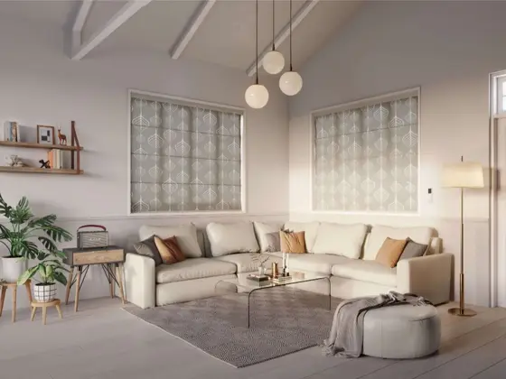 Soft fabric roller blinds in a lounge.