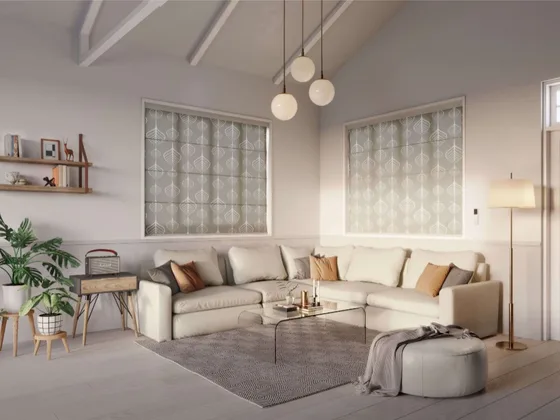 Soft fabric roller blinds in a lounge.