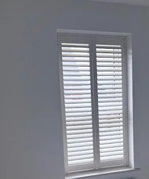 Second customer photo of white plantation shutters from Miz Abbas’s Google review