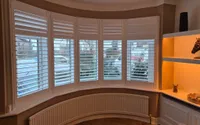 Curved bay plantation shutters in Pudsey, Leeds — Pudsey, Leeds