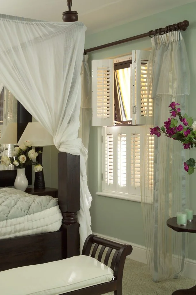 Tier-on-tier shutters in a Bradford bedroom.